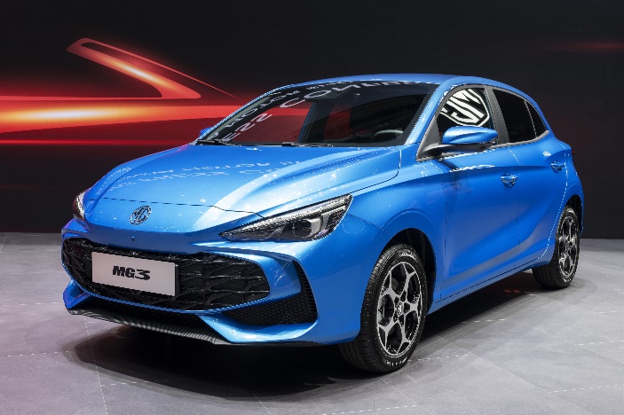 A blue car parked in a showroom
Description automatically generated